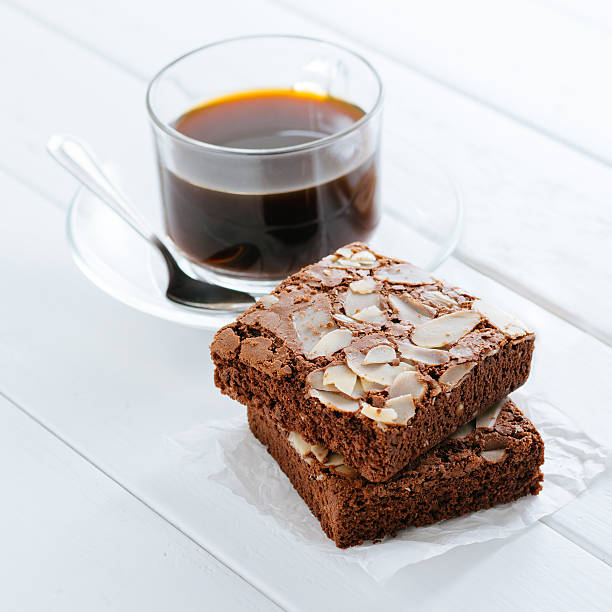 istock Almond brownies cake and hot coffee 544595278