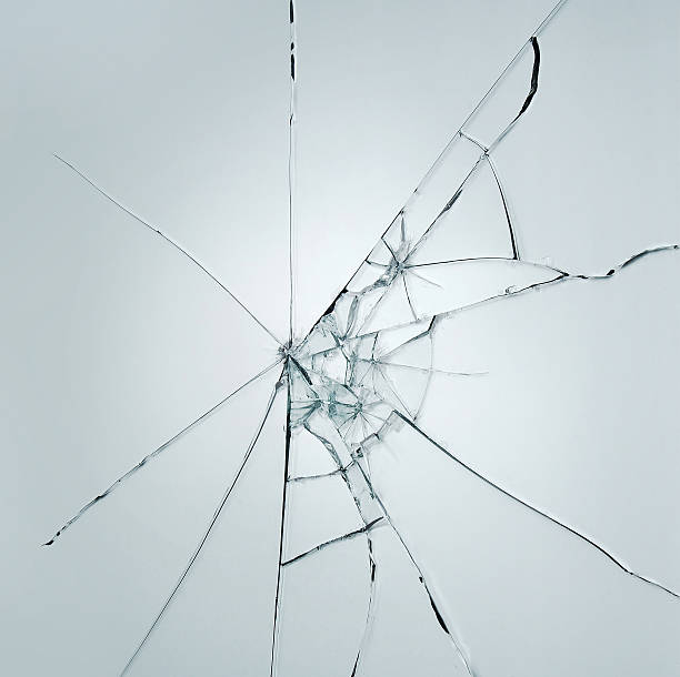 istock Broken window glass crack splitter on white gray background 544595512