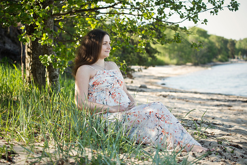 Young pregnant woman in nature (Adobe RGB)