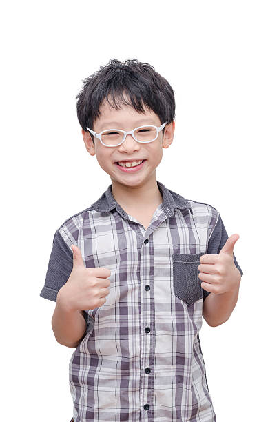 Young boy smiling over white stock photo