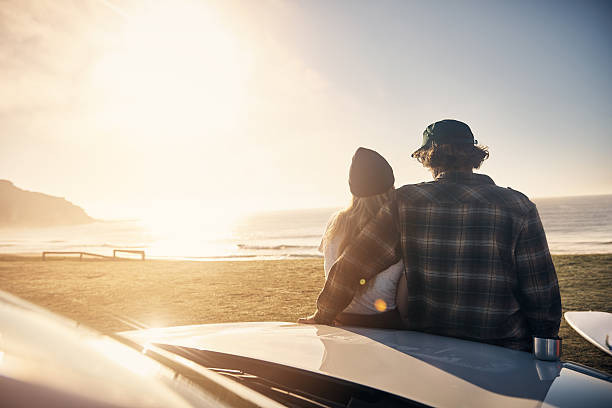 istock Watching the sunset at the beach 544597402