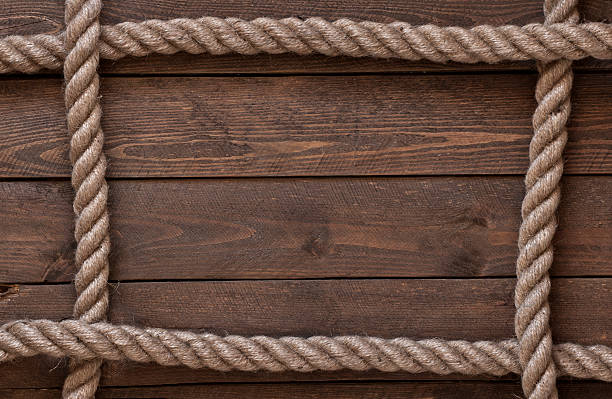 istock old vintage rope on old wooden table 544597474