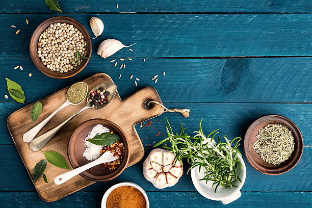 istock culinary background with spices on wooden table 544598120