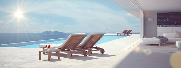 istock luxury swimming pool. color edit.3d rendering 544598606
