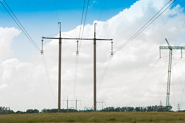 istock power line poles in the field 544598622