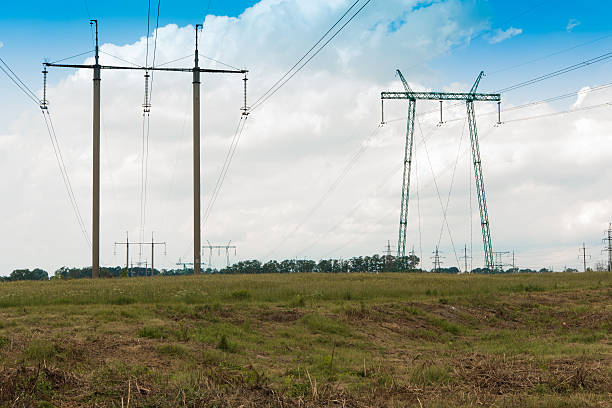 istock power line poles in the field 544598948
