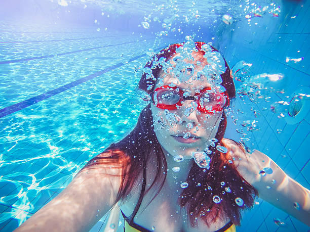 istock Girl under the water 544600064