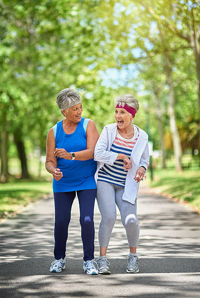 Adding The Fun Factor To Their Workout Stock Photo - Download Image Now -  Senior Adult, Exercising, Friendship - iStock