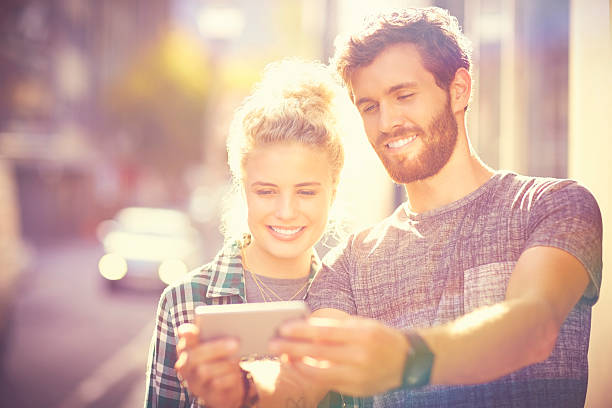 istock Happy couple taking selfie through smart phone 544602620
