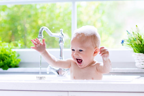 istock Cute little baby taking bath 544604796