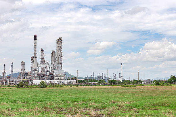 istock Oil refinery at behind the meadow 544656582