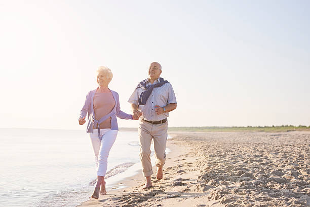 istock Vital seniors on the beach 544657804