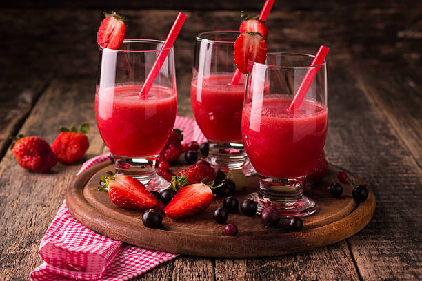 istock fresh smoothie with fruit and berries, on wooden background 544658778
