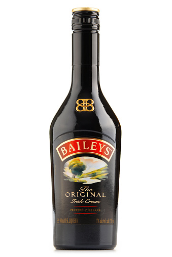 Poznan, Poland - June 23, 2016: Baileys Irish Cream is an Irish whiskey- and cream-based liqueur, made by Gilbeys of Ireland. Brand currently owned by Diageo.