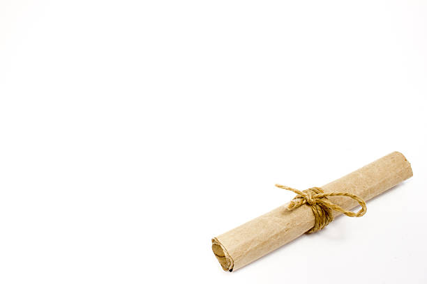 The scroll of parchment on white background stock photo