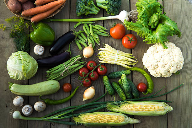 istock mix of vegetables on a wooden background 544662954