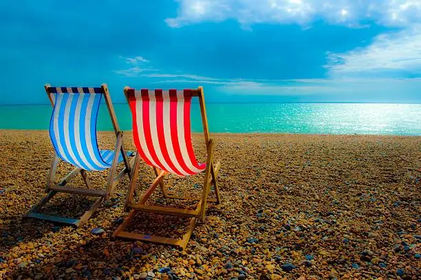 Deckchairs on the beach.