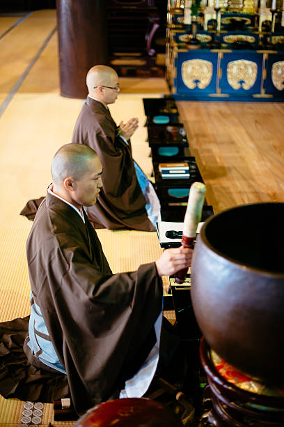 istock Monks during prayer in Buddhist shrine in Kyoto 544665650