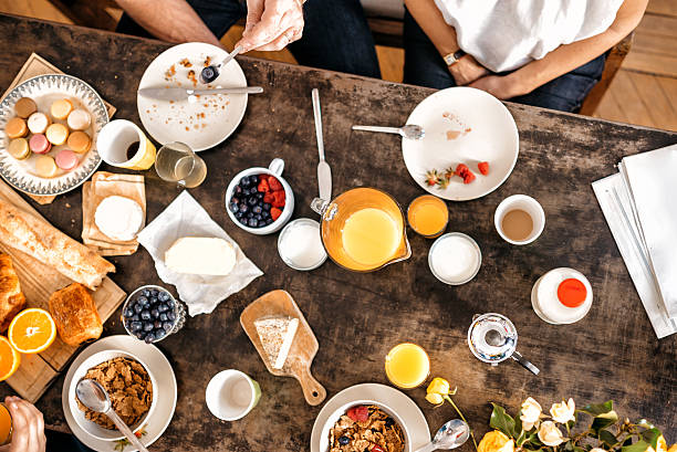 istock overhead view on  french breakfast table with macarons and baguette 544667954