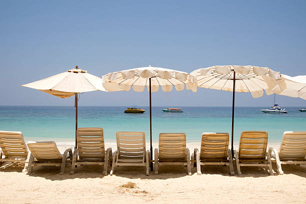istock Chairs and umbrella on a beautiful tropical beach 544670930