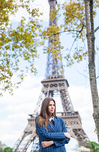 istock Young Woman By The Eiffel Tower 544671216