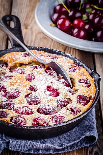 istock Clafoutis cherry pie on  wooden background 544671900