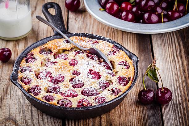 istock Clafoutis cherry pie on  wooden background 544671960
