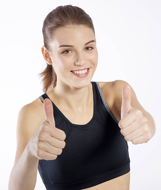 istock woman showing thumbs up 544672006