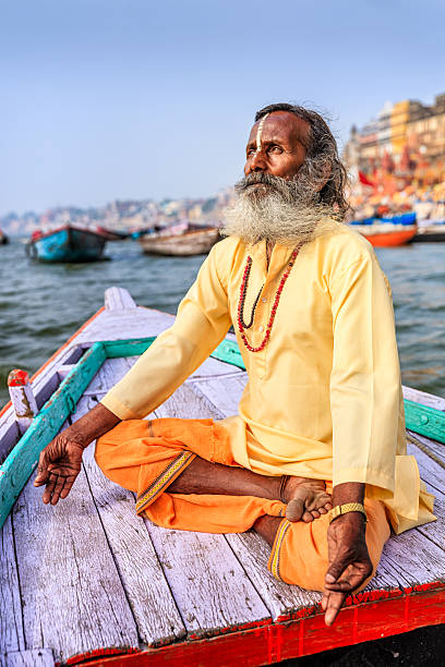 istock Sadhu is meditating in boat on Holy Ganges River, Varanasi 544672914
