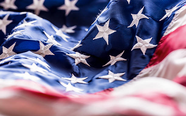 istock USA flag. American flag. American flag blowing wind. 544673032