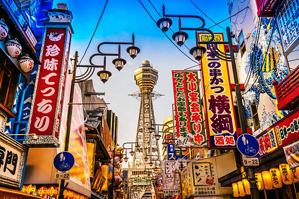Osaka Tower and view of the neon advertisements Shinsekai district 