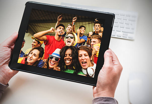 istock watching the tv on the tablet 544674450