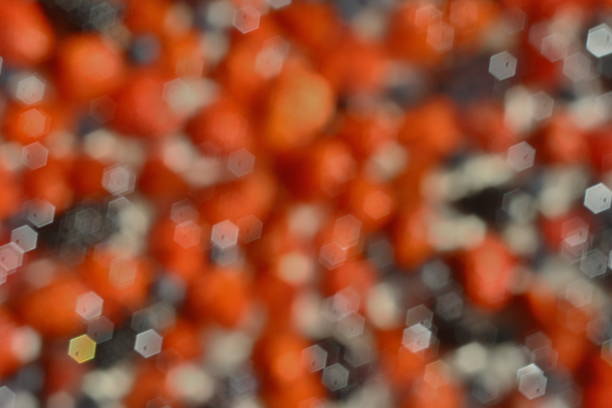 Blurred photo of strawberries, blueberries, blackberries and raspberries on cream stock photo