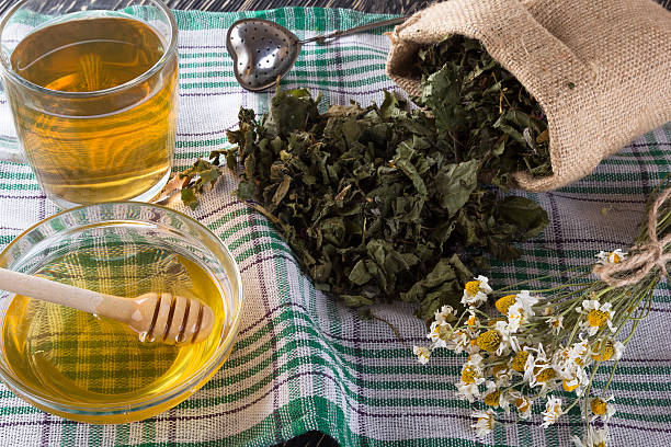 istock herbal tea, honey and chamomile. 544677822
