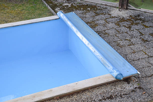 istock repairing swimming pool 544677954