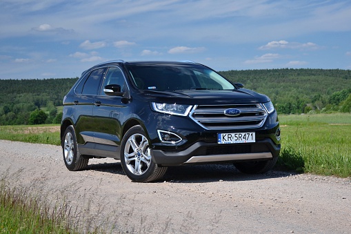 Cracow, Poland - June 8th, 2016: Ford Edge on the road during the test drive. The first geneneration of Edge was debut in 2006 on the market. The newest generation was debut in 2014. This model is the largest SUV from Ford on the European market.