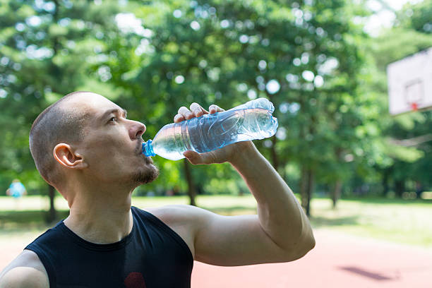 istock Man drinking water after sport 544682940