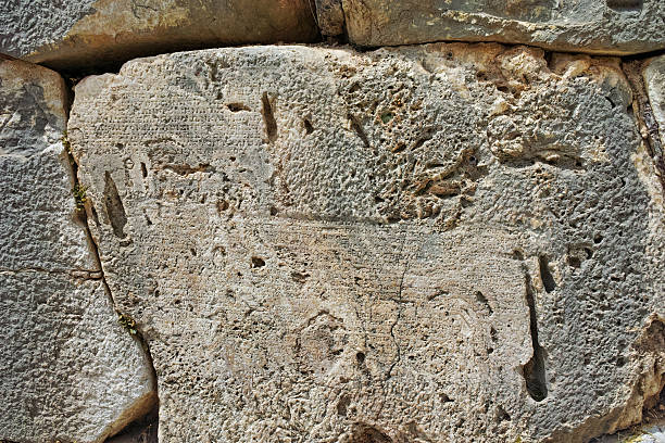 istock inscription in Ancient Greek archaeological site of Delphi, Greece 544683768