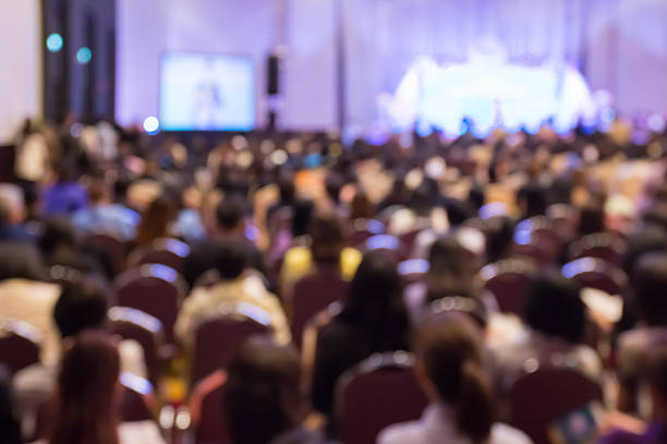 blur  audience sitting in hall or auditorium  or classroom - audience imagens e fotografias de stock