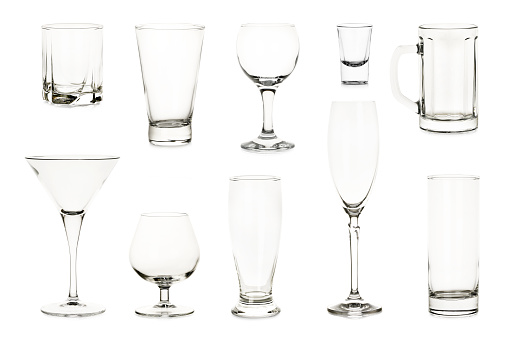 variety of empty glasses isolated on white