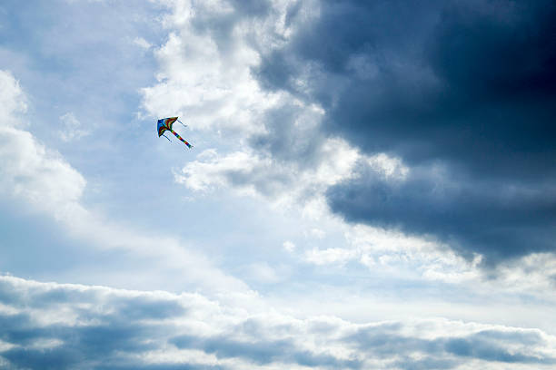 istock kite's colors in the blue sky 544684818
