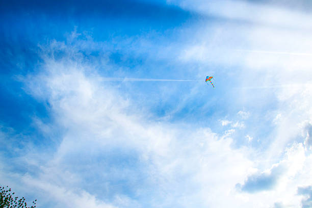 istock kite's colors in the blue sky 544684890