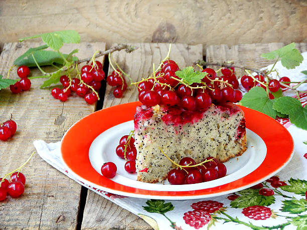 istock Piece of cake or sponge cake with red currants 544685804