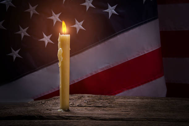 istock America's flag by candlelight. 544686360