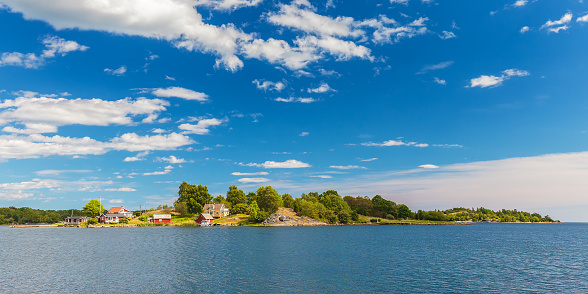 Panoramic image of a small swedish island with old wooden houses in the province of Blekinge