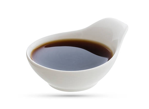 istock Dish of soy sauce isolated on white 544713842