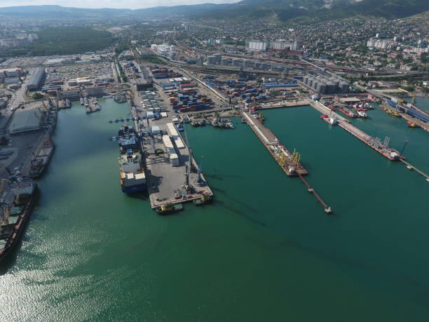 istock Industrial seaport, top view. Port cranes and cargo ships. 544716108