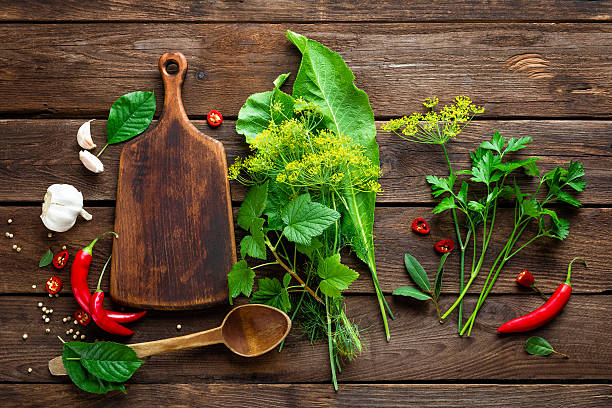 istock dark culinary background with different herbs and spices, top view 544716206