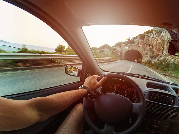 istock Drivers POV on road and tunnel 544716316