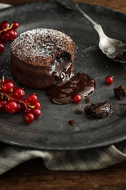 istock Warm Chocolate Lava Cake with Molten Center and Red Currants 544716426